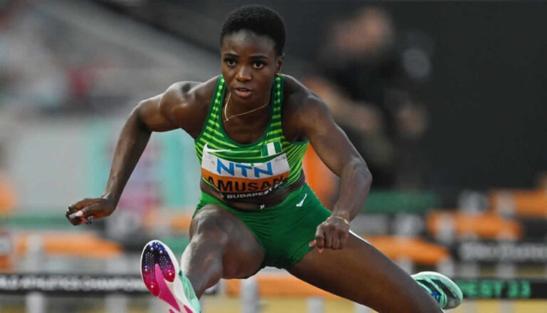 Nigerian star claims nation’s first medal in Tokyo with 12.29s finish.